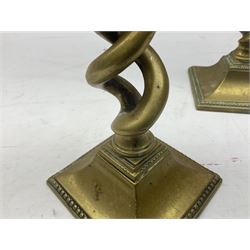 Three pairs of Victorian and later brass candlesticks, to include a pair with barley twist stems, H29.5cm, together with a pair of oak barley twist examples