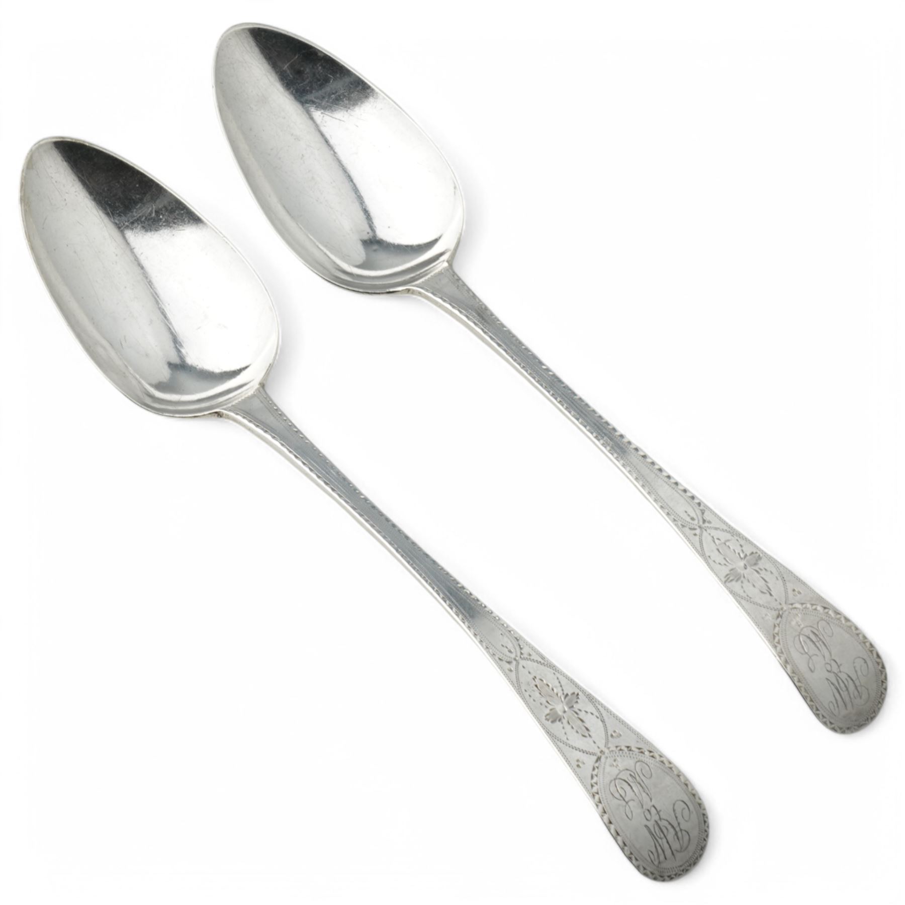 Pair of George III silvet table spoons  'AW to ML' with bright cut stems L23cm London 1799 Maker Peter, Ann and William Bateman