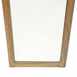 In the manner of  Yorkshire Critters - oak framed rectangular wall mirror, plain frame with carved arcade decoration to the cresting rail