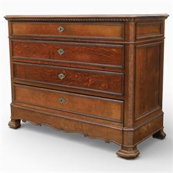 Late 19th century French provincial oak chest of drawers, moulded rectangular top with carved rope edge over four graduated long drawers with raised and fielded panels and ornate cast handles, canted angles and shaped apron below, standing on moulded block feet,