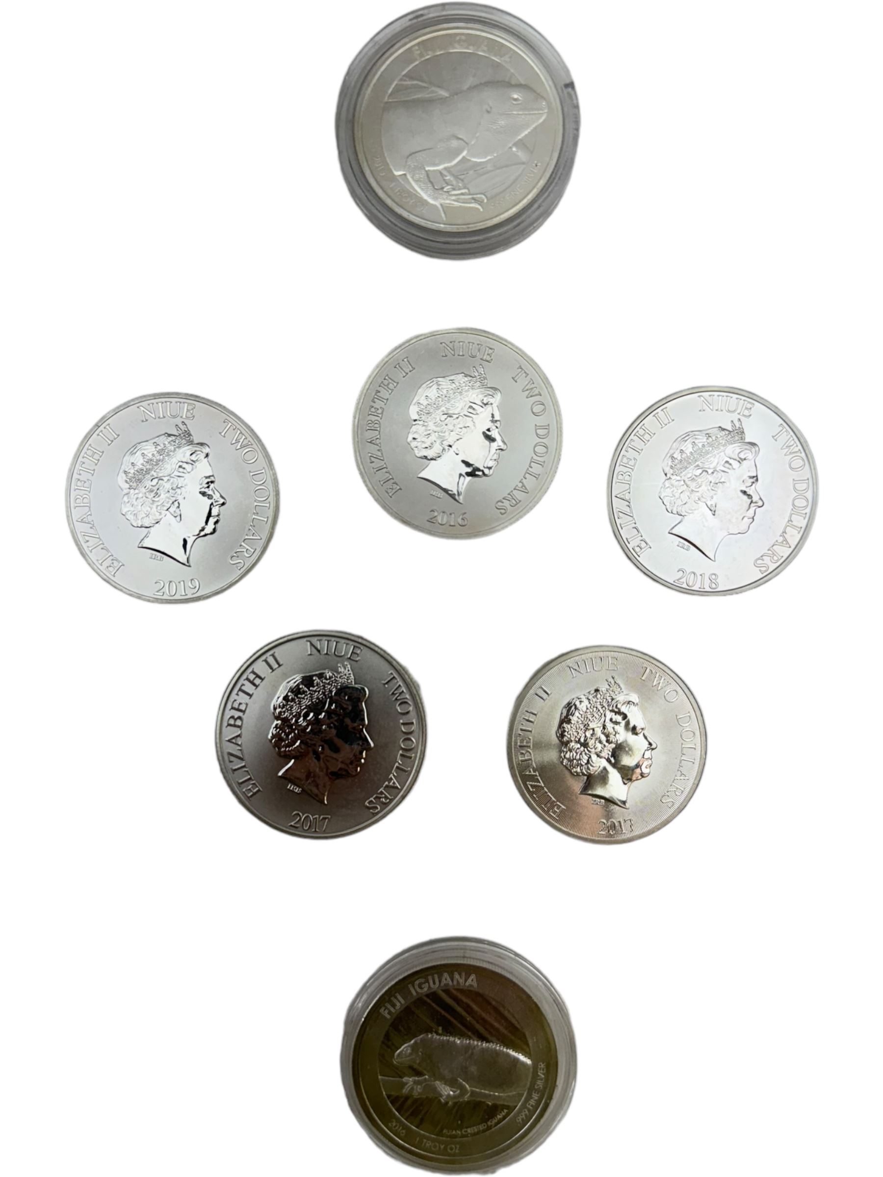 Five Queen Elizabeth II Niue one ounce fine silver two dollars coins dated 2016 'Turtle', 2017 'Panda', 2017 'Darth Vader', 2018 'Stormtrooper', 2019 'Clone trooper' and two Fiji one ounce fine silver one dollar coins dated 2015 'Iguana', 2016 'Iguana' (7)
