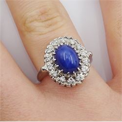 14ct white gold star sapphire and diamond cluster ring