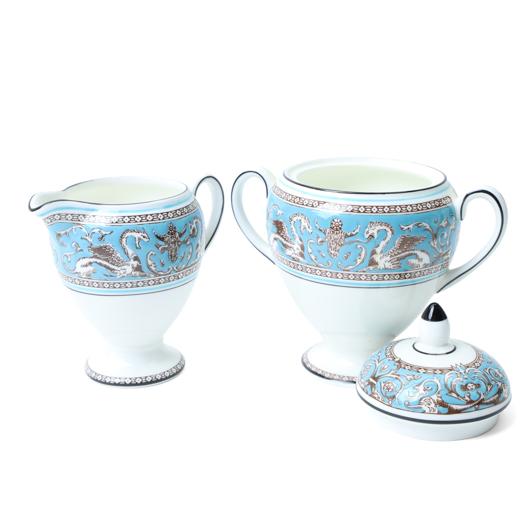 Extensive Wedgwood Turquoise Florentine part service tea, dinner and coffee service for six covers comprising six dinner plates, six dessert plates, six soup bowls and stands, pair of vegetable dishes and covers, gravy boat ad stand, oval meat plates, six tea cups and saucers, six coffee cans and saucers, six tea plates, teapot, coffee pot, sucrier and cover, sugar bowl, milk and cream jugs and cake plate, 72 pieces