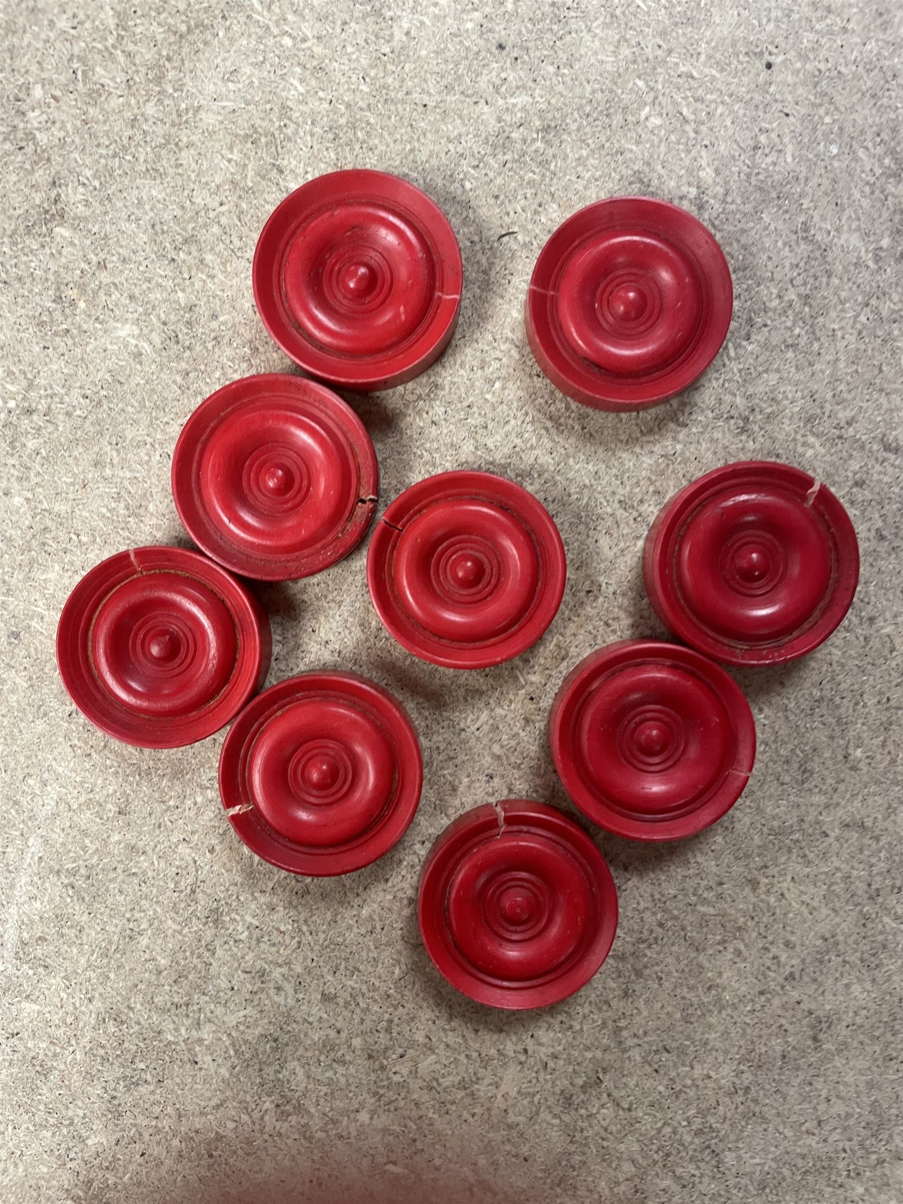 19th century walnut and brass bound games compendium box, painted to enhance the grain, of rectangular form, the hinged opening cover with rounded sides, central brass cartouche with engraved lion crest, and brass riveted straps, opening to reveal a red leather and blue silk lined compartmented interior, with fold-down games board, and lift-out tray containing playing cards, ebony turned dice towers, white and red stained bone draughts, and chess pieces, ivory dice, and ivory and ebony whist markers, and brass bezique board, cribbage board and markers, H15cm W32cm D24cm
This lot has been registered for sale under Section 10 of the APHA Ivory Act