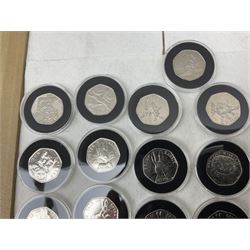 Thirty-seven commemorative fifty pence coins, including 2011 wrestling, other Olympics, Beatrix Potter etc, housed in capsules