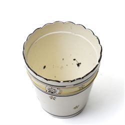 Russian, probably Gardner figure of a man pushing a wheelbarrow on gilt lined rectangular base, impressed mark, H16cm, 18th century creamware beaker with star shape decoration, 18rh century Worcester cup with panels of flowers on a blue ground and a French shell shape scent flask (4)