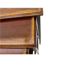 Edwardian mahogany nest of tables, rectangular moulded tops with satinwood band, square supports terminating at turned feet, the smallest table with two integrated cake stands 