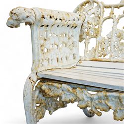 Coalbrookdale design - early 20th century cast iron oak leaf and acorn bench, white painted cast iron frame with slatted wooden seat, the pierced and shaped back decorated with scrolling oak branches and leafage, flanked by dog mask arm terminals over cabriole supports with paw feet 