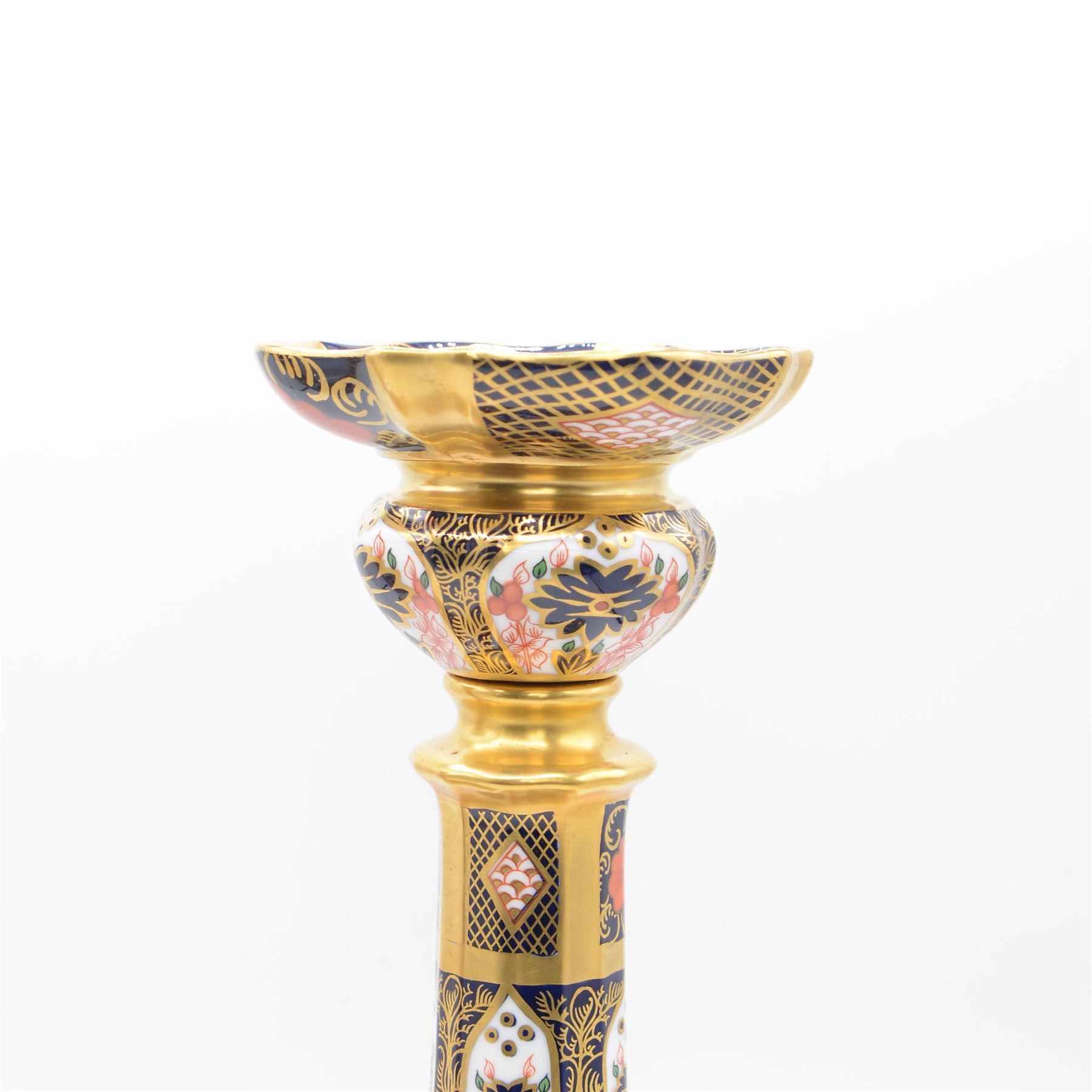Pair of Royal Crown Derby Imari 1128 pattern candlesticks with printed marks beneath including year cypher for 1987, second quality, H27cm 