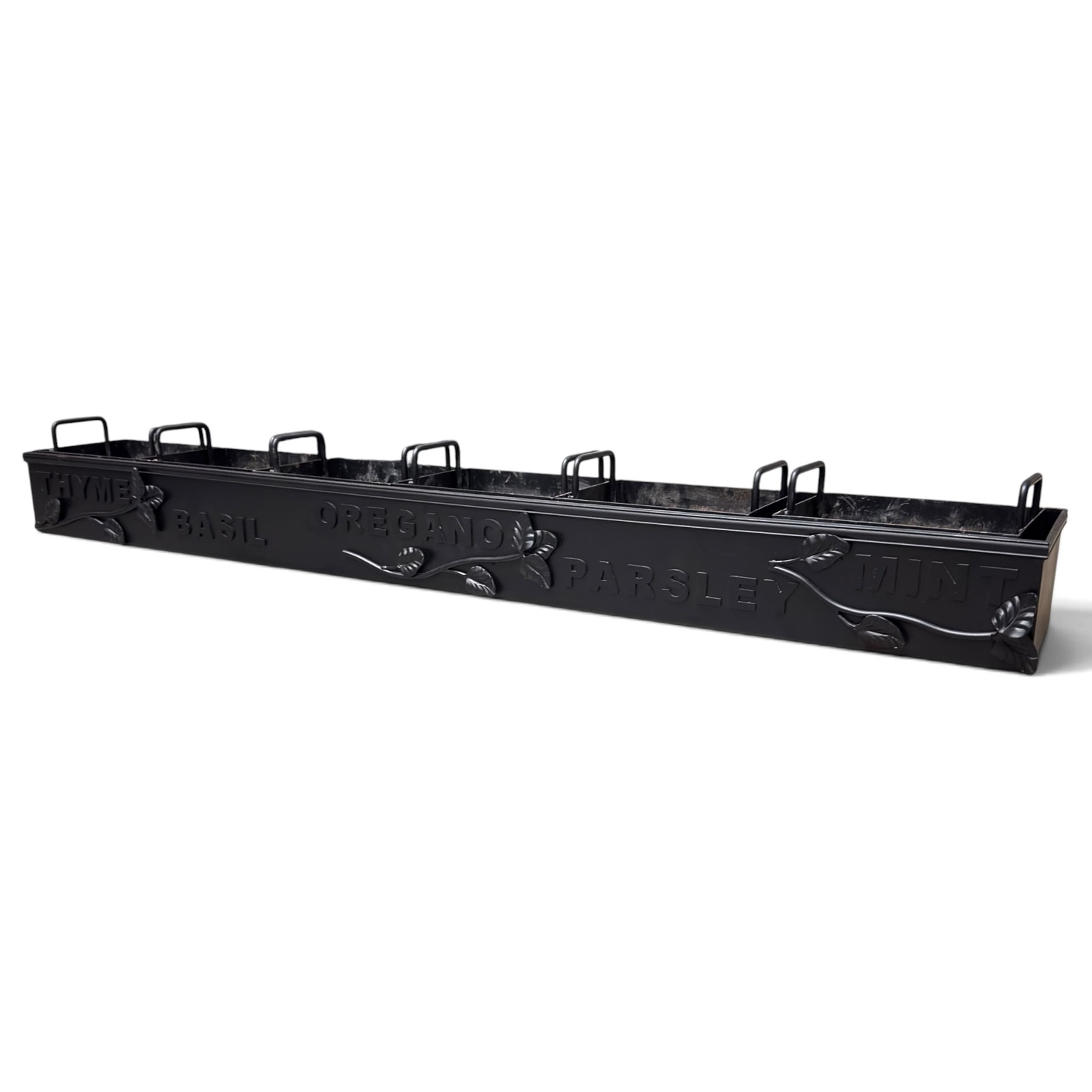 Black-painted iron herb planter, the long rectangular body embossed ‘Thyme, Basil, Oregano, Parsley, Mint’ with applied foliate decoration, containing five removable handled liners