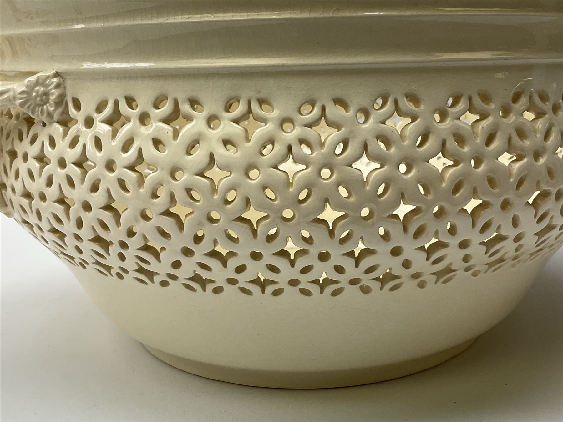 Large 20th century Leeds pottery basket and cover, of bulbous form with pierced detail and twin rope handle, with impressed mark beneath, H23cm D25cm