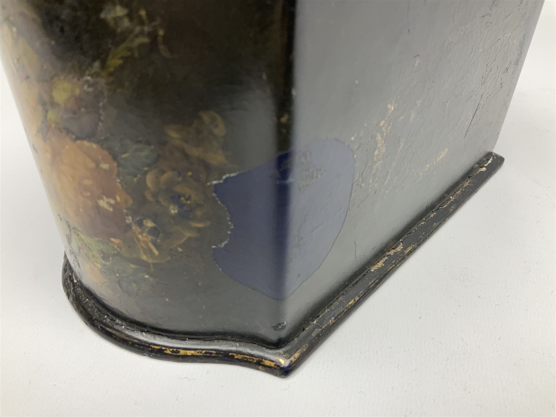 Victorian papier-mâché stationary box, of rounded wedge form with mother of pearl escutcheon, the hinged and curved cover and sides hand painted with floral sprays, opening to reveal a lined and fitted interior, H15cm L22cm D16cm