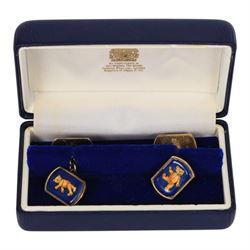 Three pairs of silver cufflinks, comprising jockeys cap pair, Halcyon days teddy bear enamel pair and a 1995 enamel pair, together with two other pairs of novelty cufflinks