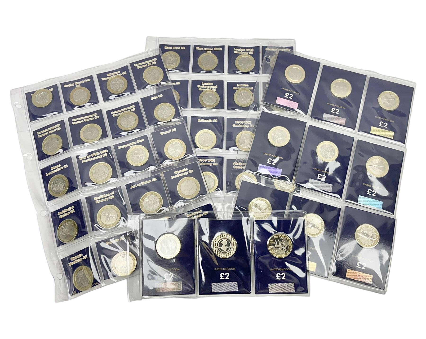 Mostly United Kingdom Queen Elizabeth II commemorative two pound  coins, including 2017 'Jane Austen', 2018 'Sea King', 2018 'Vulcan' etc face value of UK coins approximately 98 GBP
