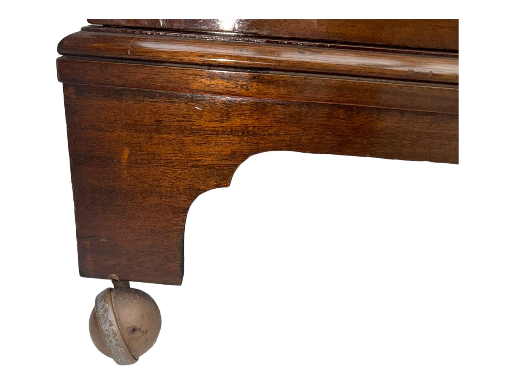 Wylie & Lochhead, Glasgow - early 20th century mahogany and satinwood double wardrobe, projecting cornice over panelled doors, interior fitted with mirrored door, shelves, drawers, hooks and hanging rail, raised on bracket supports with ceramic castors