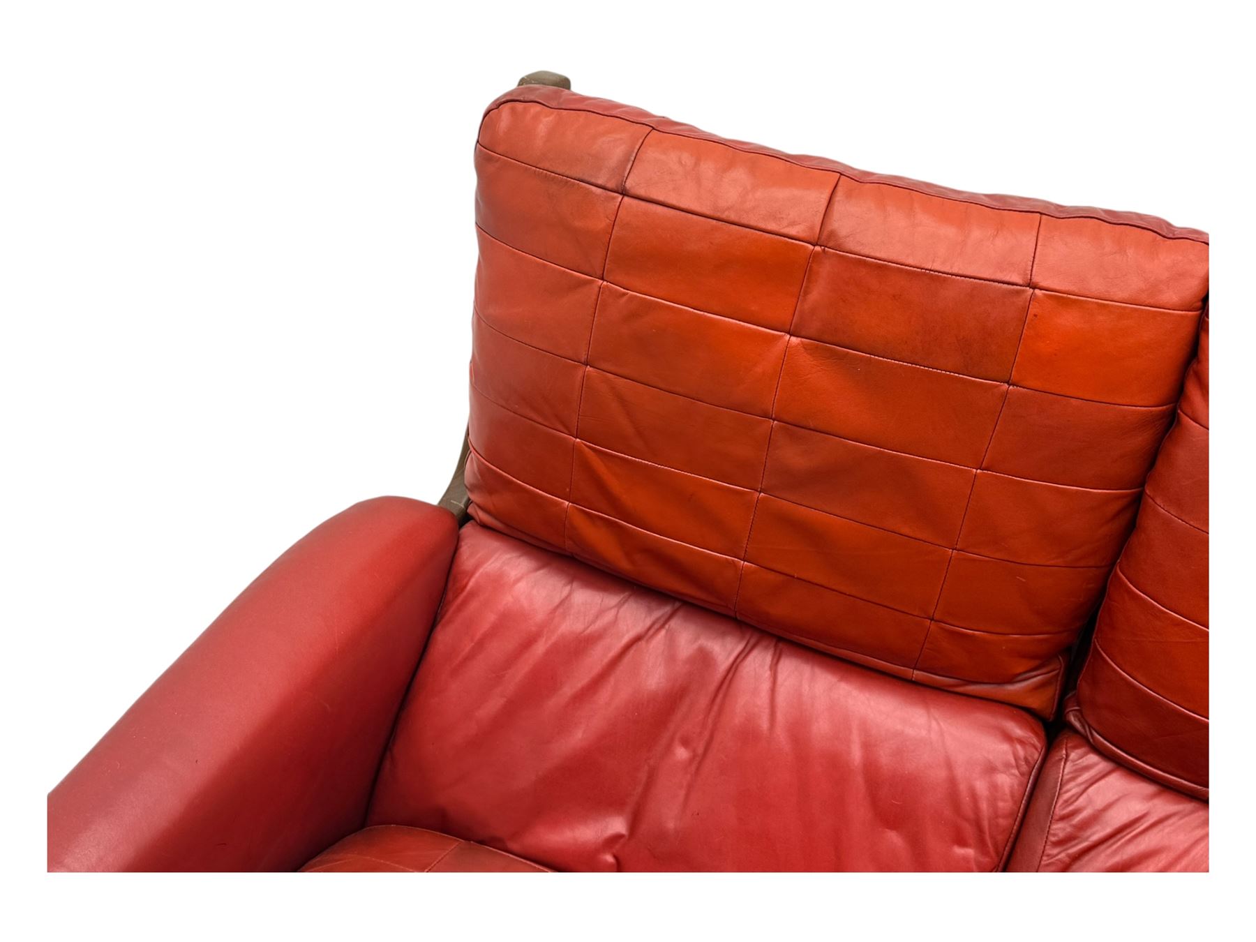 Folke Ohlsson for Gimson & Slater - mid-20th century Danish teak-framed sofa, red leather upholstery with patchwork design, raised on shaped teak side supports