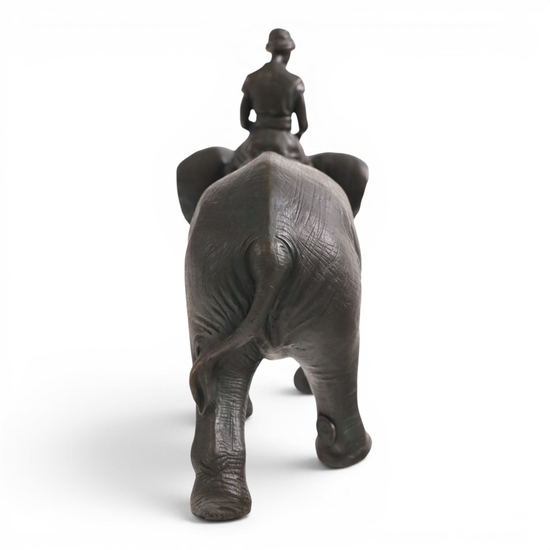 Bronzed figure of an Indian Elephant with rider, H24cm