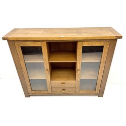 G-Plan medium oak display cabinet, two glazed doors flanking single shelf and two drawers, stile supports 