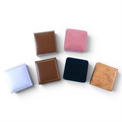 Collection of velvet and leatherette jewellery boxes in various colours