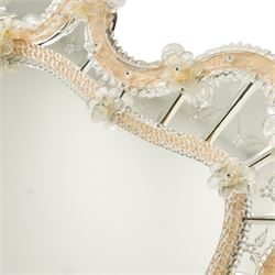 20th century Venetian glass wall mirror, the shaped plate within a mirrored frame applied with clear glass flowerheads and moulded glass edging, with etched floral decoration to the bevelled 'frameless' plates, the inner slip with ropetwist moulded glass