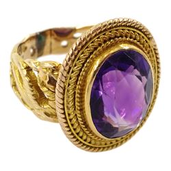 Gold oval amethyst ring, with rope twist decoration surround, the shank decorated with pierced dragon design