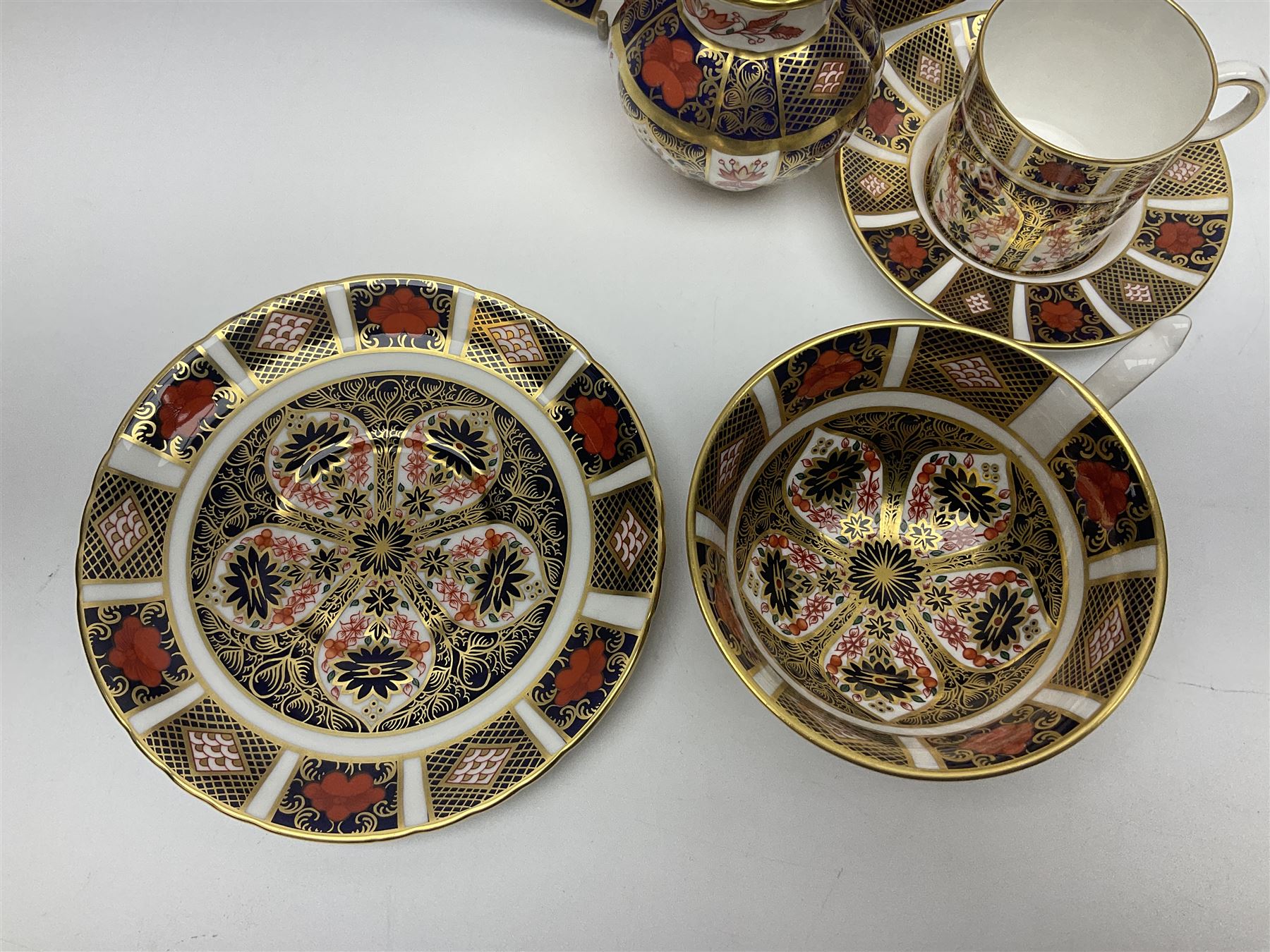 Royal Crown Derby Old Imari pattern miniature vase, coffee can and saucer, teacup and saucer and plate, all with printed mark beneath, vase H8cm 