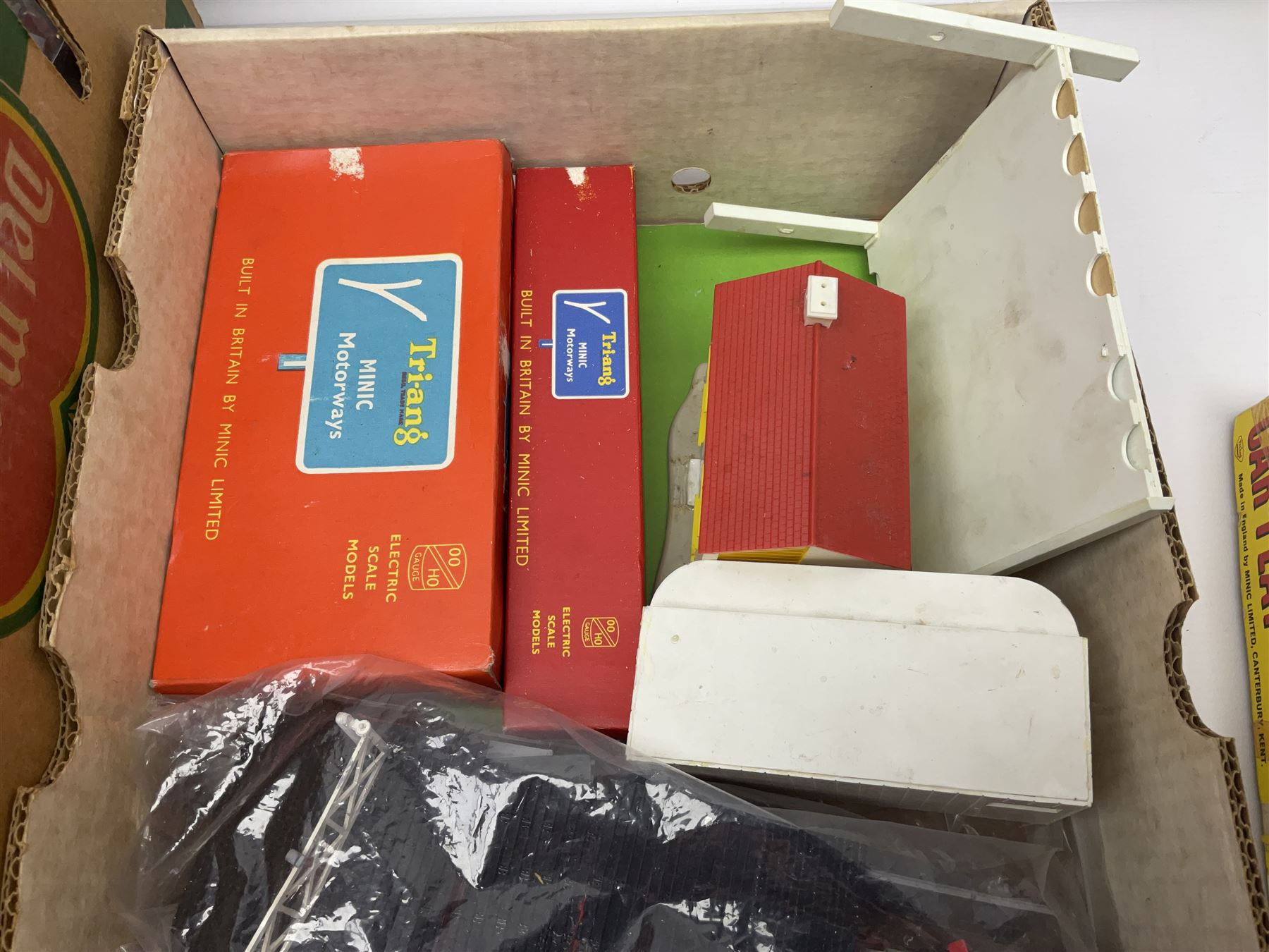 Tri-ang - quantity of '00' gauge model railway and Minic Motorways slot-racing items including Class B12 4-6-0 locomotive No.61572; boxed; seven goods wagons in five boxes; R576 Tunnel and Island Platform Set; both boxed; quantity of track and power unit; four Minic Cars and two controllers; boxed Customs Barrier and Frontier Post Set; railway car transporter and car loading ramp; quantity of track and trackside accessories; and boxed Car-Play Filling Station Set