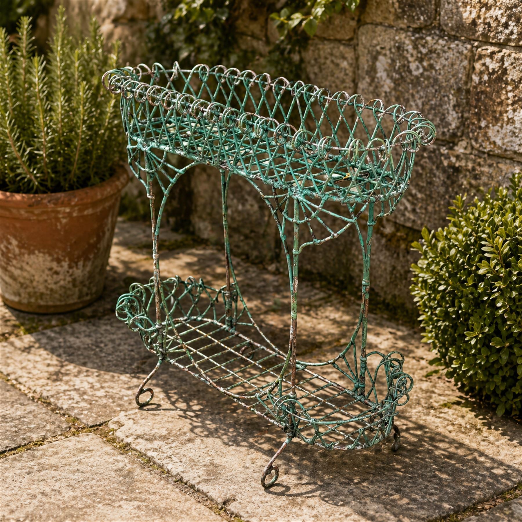 Victorian country house ornate wirework basket conservatory or garden planter, two tier form with oval centre