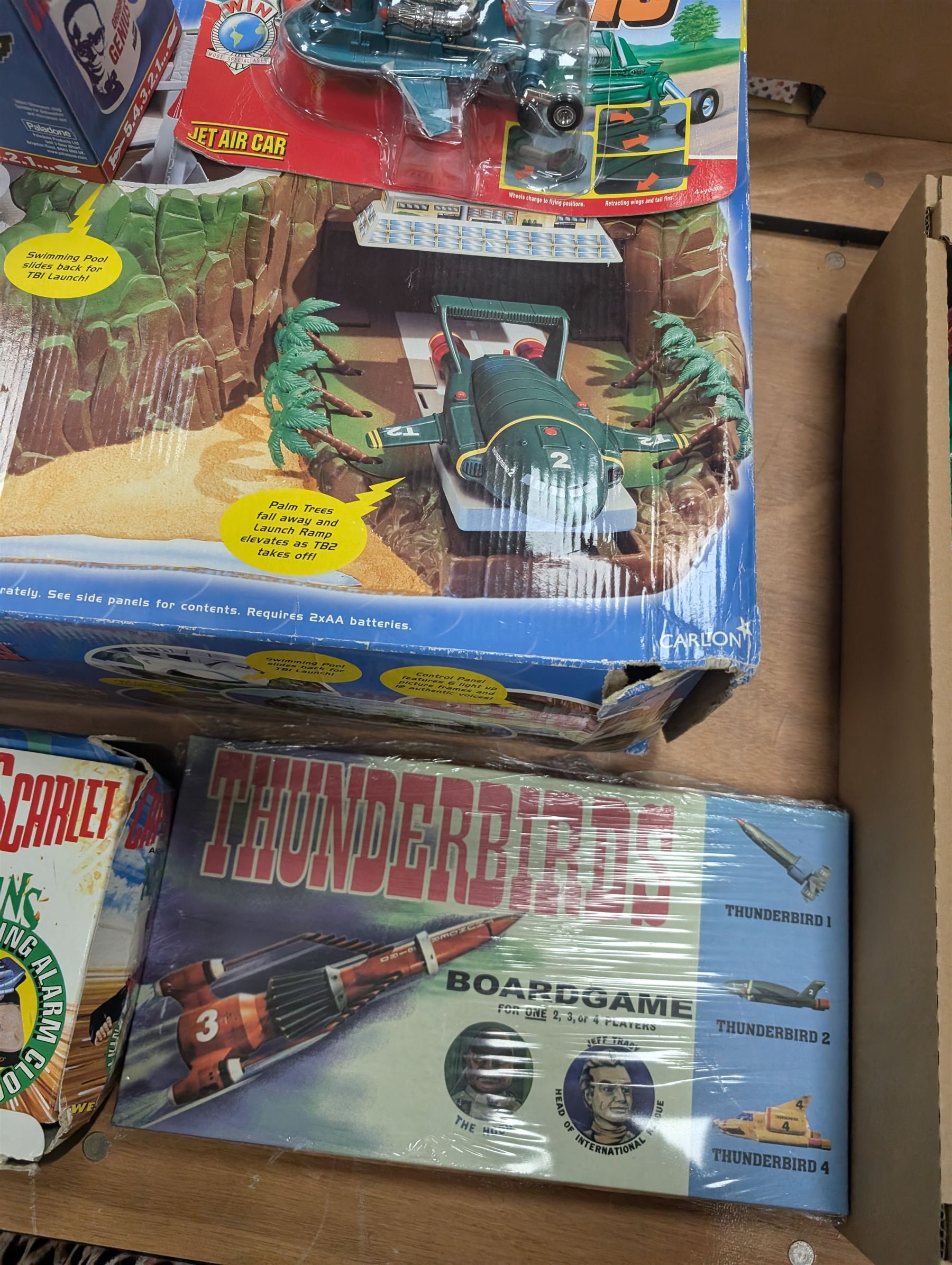 Gerry Anderson interest collectables and toys, including Carlton Thunderbirds Tracy Island, Matchbox Stingray Marineville Headquarters, both boxed, Matchbox carded Thunderbirds and Stingray figures and vehicles, Captain Scarlet and Joe90 collectables, etc