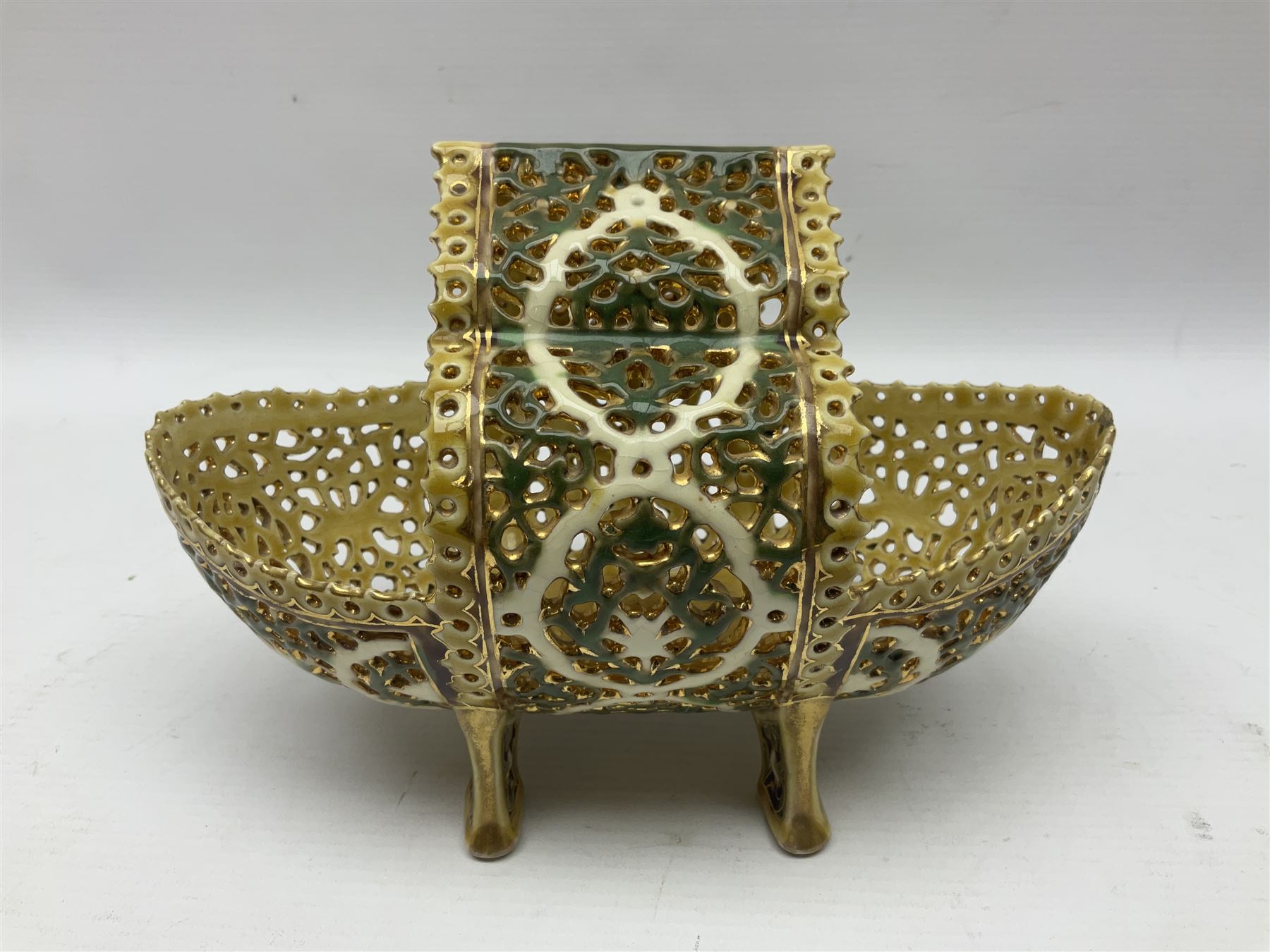 Hungarian Zsolnay Pecs gilt and green reticulated basket, upon four feet, with gold mark beneath, H14cm L21cm