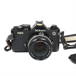 Two Nikon FM camera bodies, comprising Nikon FM serial no. 3239117, with a Nikon Series E 36-72mm 1:3.5 zoom lens and a Nikon FM2 serial no. 7141741, with a Nikkor 50mm 1:1.8 lens and a Nikon Series E 70-210mm 1:4 zoom lens
