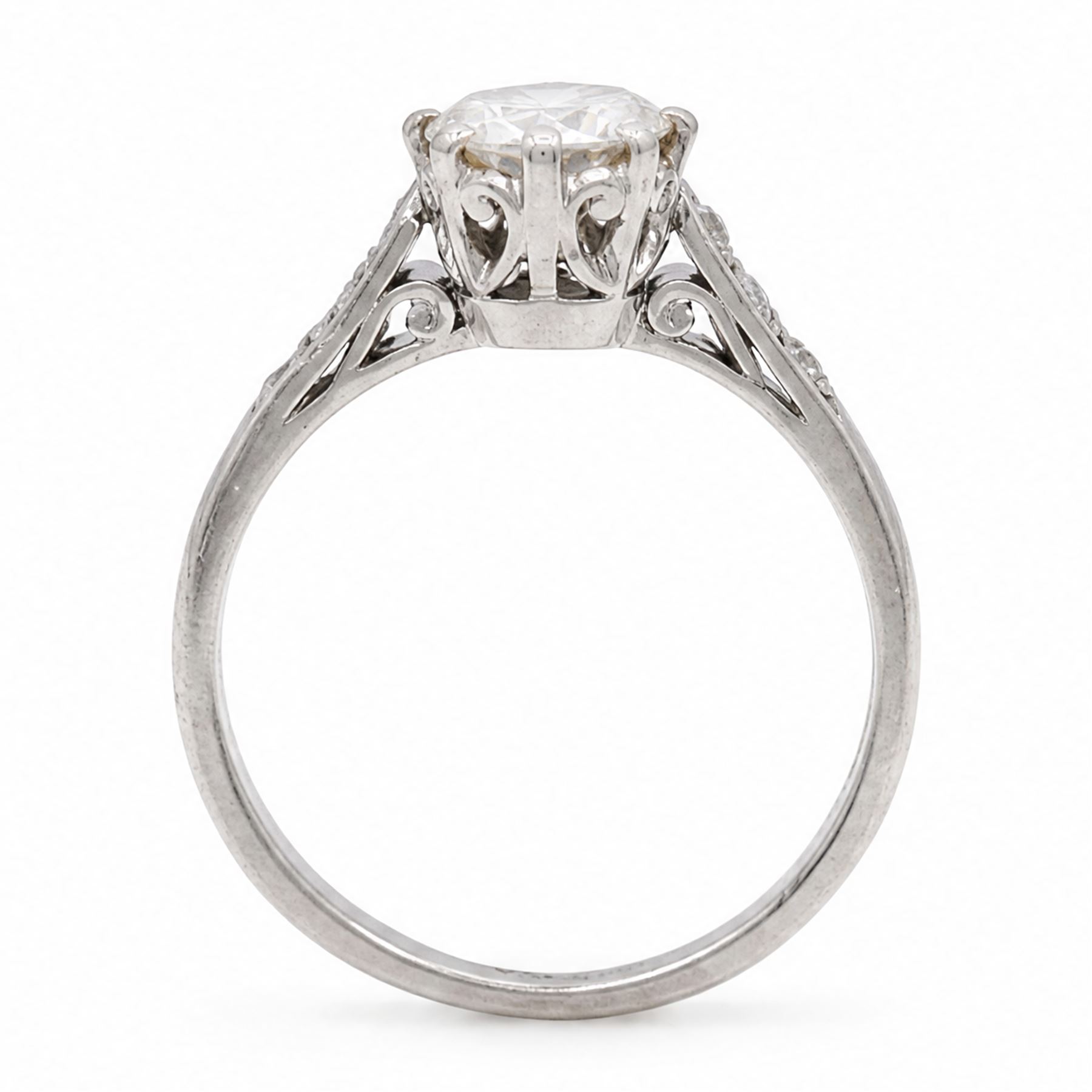 Platinum diamond ring, single round brilliant cut diamond of approx 0.85 carat, with diamond set shoulders, stamped Plat