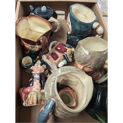 Collection of character and toby jugs and teapots, mostly Royal Doulton examples, in three boxes 