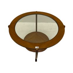 Pair of mid-20th century teak circular coffee table, inset glass top, with under-tier