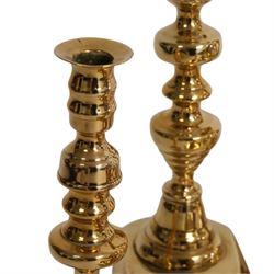 Pair of 19th century brass chamber candlesticks with detachable snuffers, together with three pairs of brass candlesticks 