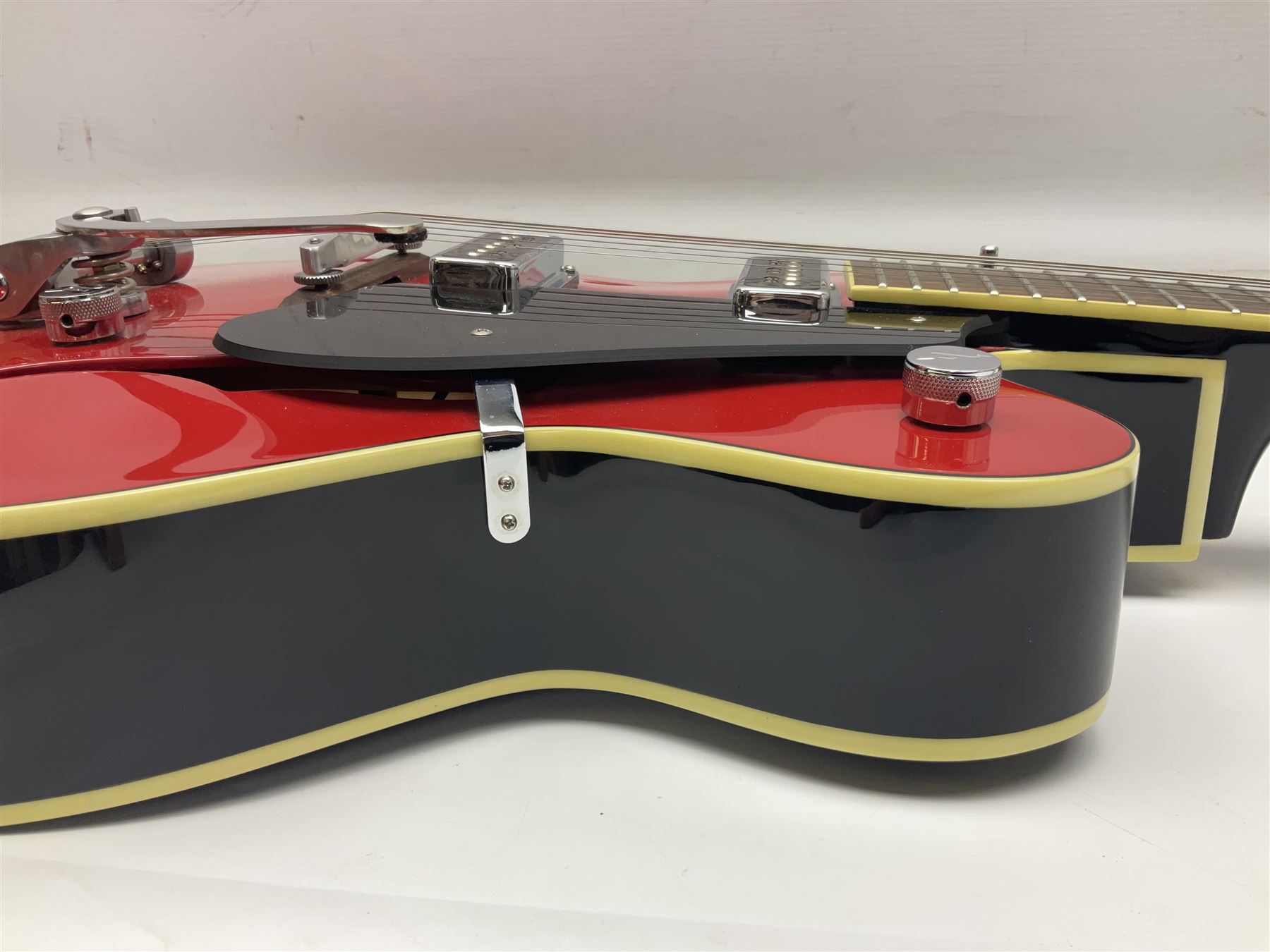 Gretsch Electromatic semi-acoustic guitar model G5129 in black and red with Bigsby tremolo, serial no.KS05063904; L105cm; in fitted hard carrying case