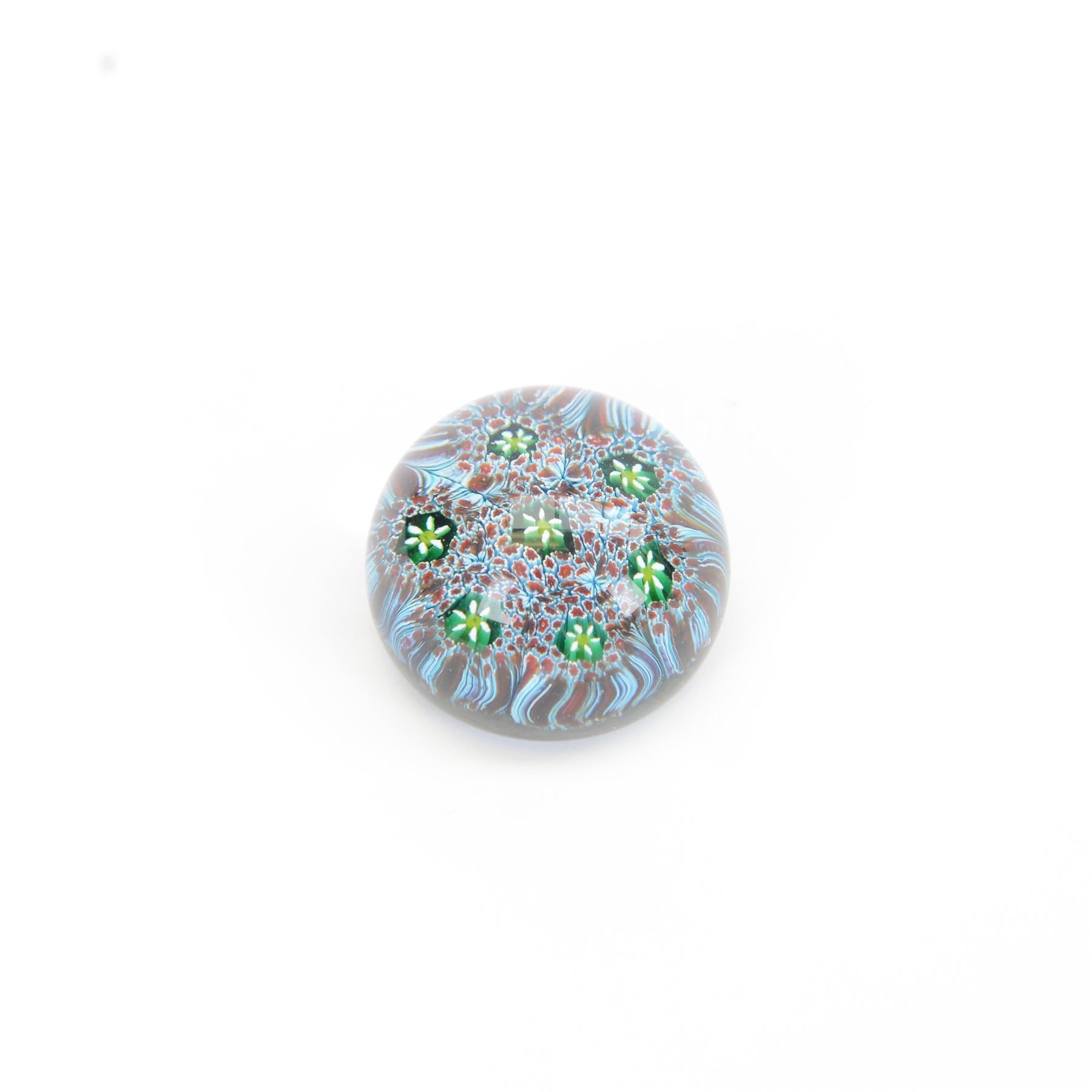 Nine miniature milleifiori paperweights including an example with twisted canes 