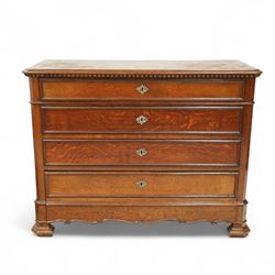 Early 20th-century French oak commode, the rectangular top above four long drawers with sh...