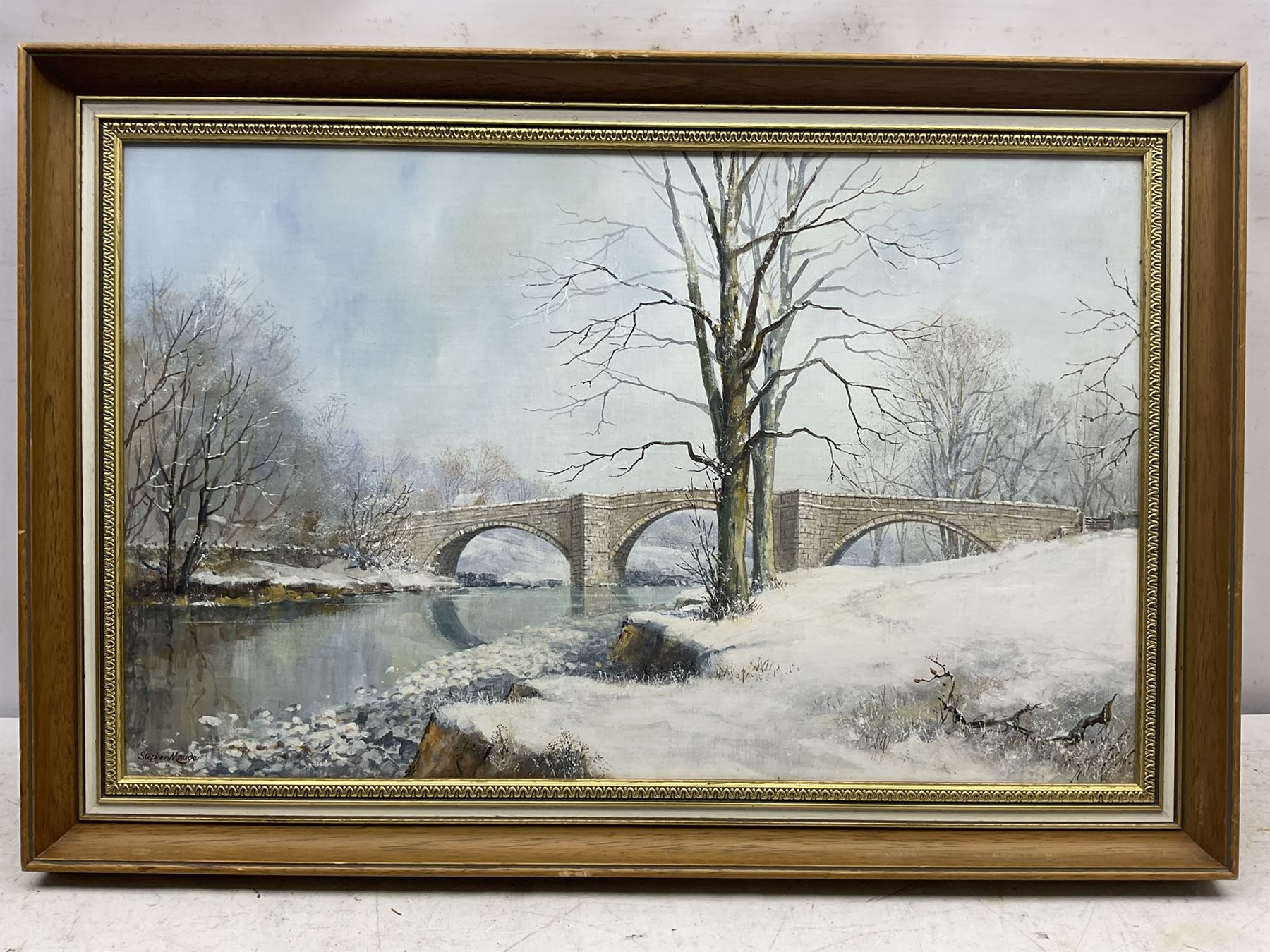 Stephen Maude (British 1919-): 'Barden Bridge Wharfedale in Winter', acrylic on canvas board signed, titled signed and dated 1983, 42cm x 67cm