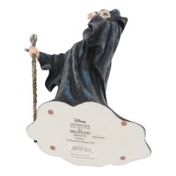 Disney Showcase Haute Couture figures, comprising Evil Queen, Cruella Devil and two Malificent, all boxed