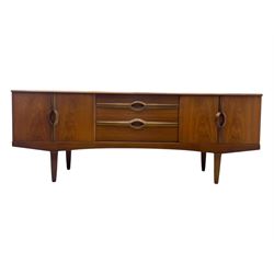 Stonehill - mid-20th century teak sideboard, three central drawers flanked by concertina cupboard doors, on tapering supports