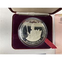 Jamaica 1975 eight coin proof set produced by the Franklin Mint and a Jamaica 1978 sterling silver proof twenty-five dollar coin, both cased with certificates