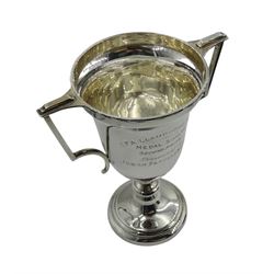 Silver presentation twin handled trophy cup by Joseph Gloster Ltd, Birmingham 1937, approx 6.5oz, on bakelite stand