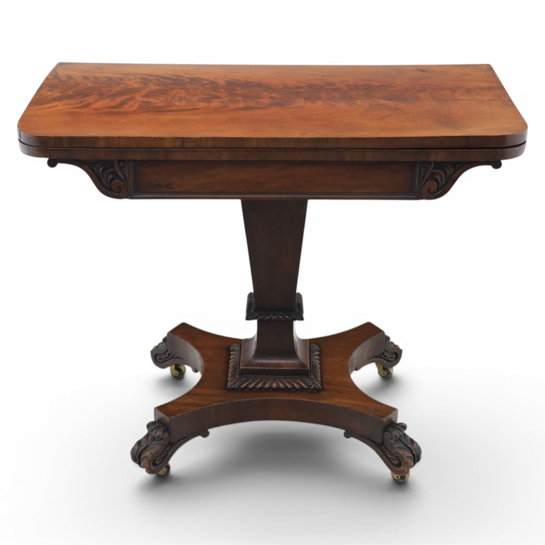 Victorian figured mahogany side table, fold-over swivel extending top, tapering square column above quatrefoil base