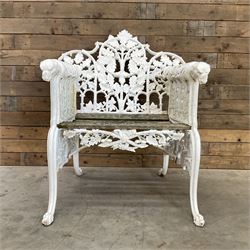 20th century Coalbrookdale design cast iron oak leaf and acorn armchair, white painted cast iron frame with slatted wooden seat, the pierced and shaped back decorated with scrolling oak branches and leafage, flanked by dog mask arm terminals over cabriole supports with paw feet