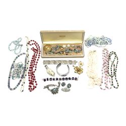 Collection of pearl necklaces, vintage brooches, bangles and other costume jewellery