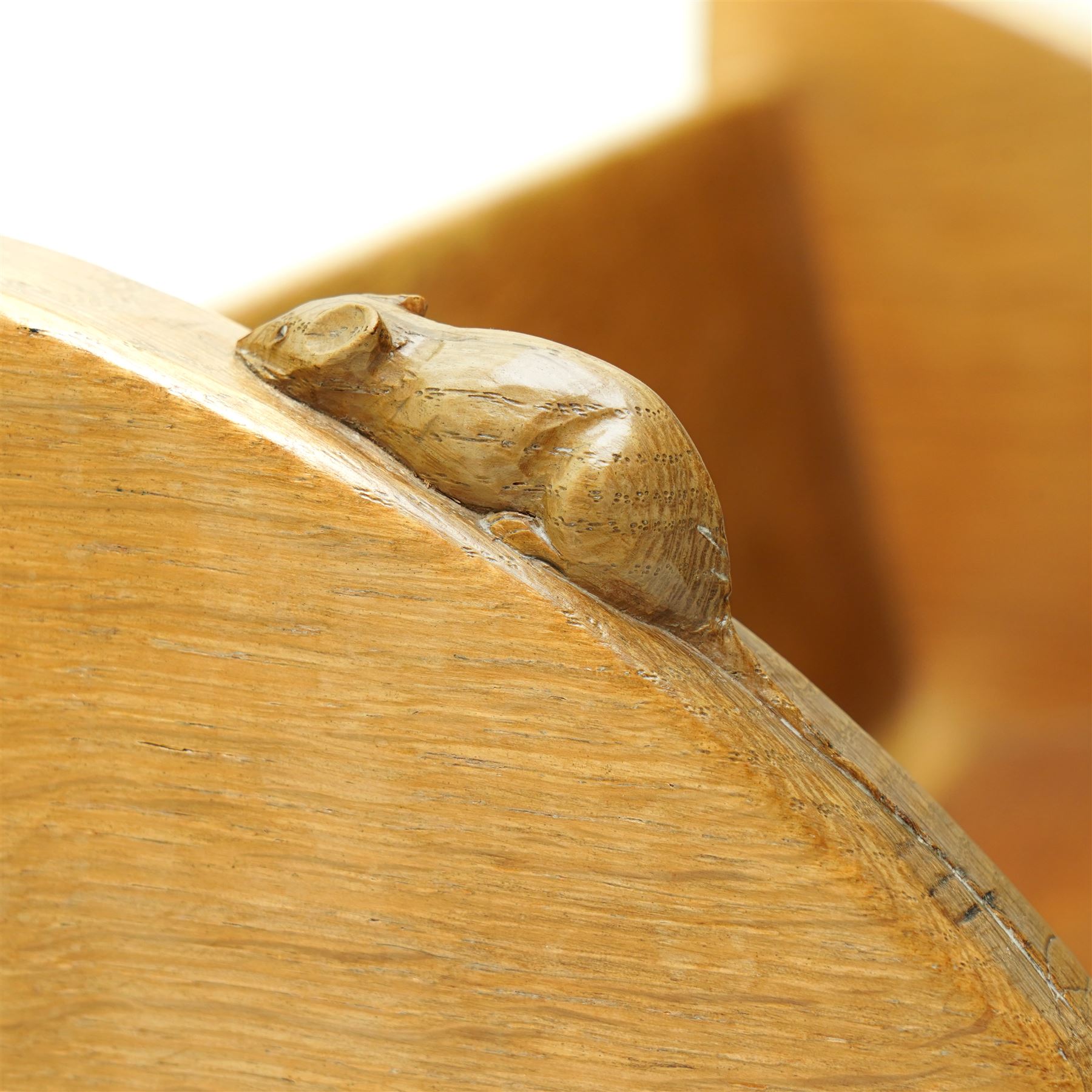 Mouseman - oak book trough, curved end supports, with carved mouse signature, by the workshop of Robert Thompson, Kilburn W46cm