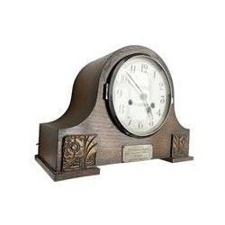 1930s Enfield striking mantle clock in an oak case, with pendulum.