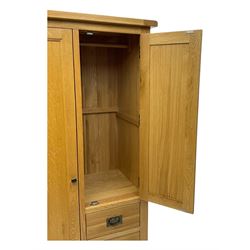 Light oak combination wardrobe, fitted with full-height compartment, single cupboard and three small drawers