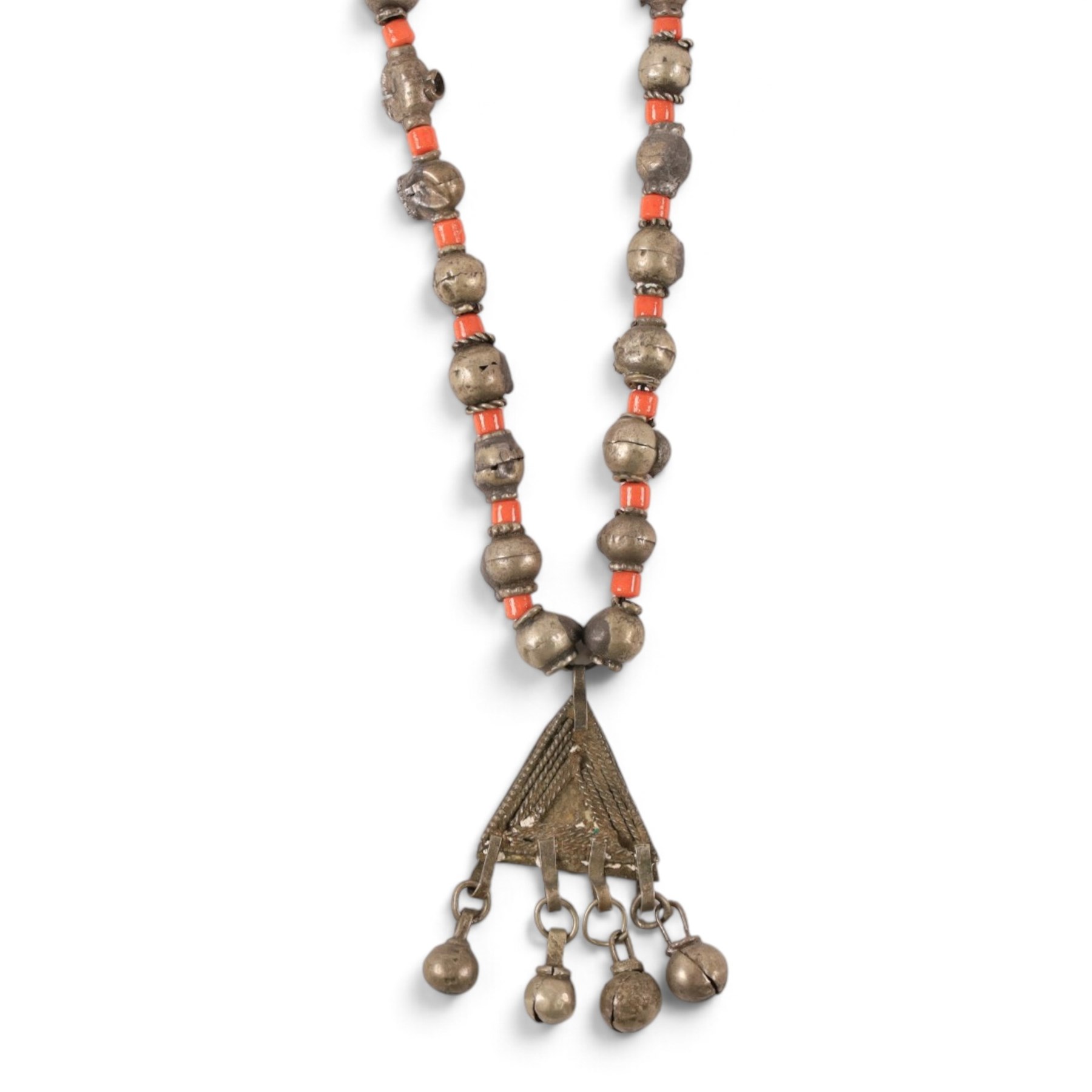 Collection of Middle Eastern jewellery, including silvered multi strand necklace with beadwork and filigree decoration with three cylindrical pendants, pendant necklace with central orange cabochon, beadwork choker and similar  